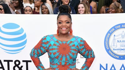 We adore Community star Yvette Nicole Brown, and we're also huge fans of this aqua and blood orange gown by Toronto-based label Ofuure. AP / Richard Shotwell
