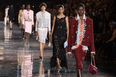 Looks from the Chanel spring/summer 2027 collection by Matthieu Blazy, who framed the show as a look back the maison's history. EPA