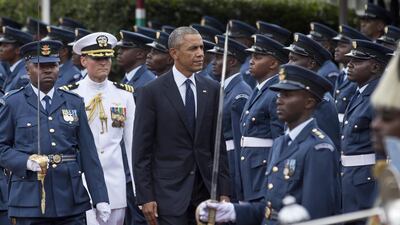 US president Barack Obama inspects the honour guard after arriving to meet with Kenya's president Uhuru Kenyatta at state house in Nairobi, Kenya on July 25, 2015 - the first visit by a sitting American president to the country. Ben Curtis/AP Photo