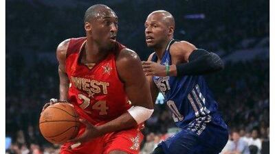 Kobe Bryant, left, goes past Ray Allen during the West's All-Star win over the East. Jeff Gross / AFP