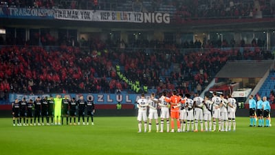 Players observe a minute of silence for victims of earthquake in Turkey and Syria. AP
