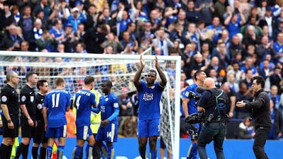 Leicester City's Wes Morgan, centre, celebrates their win at the final whistle of the English Premier League match between Leicester City and Southampton at The King Power Stadium in Leicester, Britain, 03 April 2016. EPA/TIM KEETON