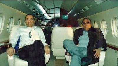 Hussein Salem, 78, (right) a business tycoon with close ties to the Mubarak regime, and his son, Khaled Salem, in what appears to be the family's private jet. A Spanish court approved Salem's extradition to Egypt earlier this year but it has been delayed by his asylum request.
