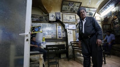 But after buying the cafe in 1967, he was free to hang as many photos as the walls could hold. Safin Hamed / AFP