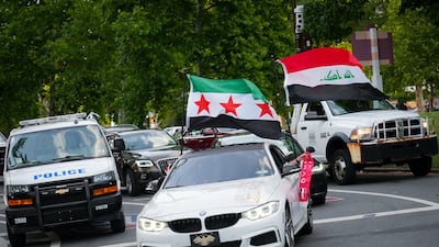 Cars displaying the Iraq and Syrian flags in Philadelphia. Joshua Longmore / The National