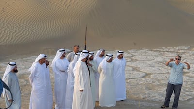 Sheikh Mohammed bin Rashid, Vice President and Ruler of Dubai, inspects finds at Saruq al-Hadid, the ancient trove he sighted from the air in 2002. WAM