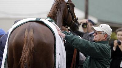 California Chrome shown with trainer Art Sherman at Churchill Downs in Kentucky in May 2014. Garry Jones / AP