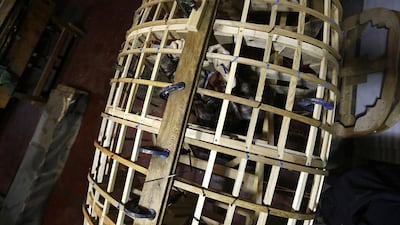 Jason Kavanagh works on a boat at the Galgael Trust in Govan, Glasgow, Scotland. Stefan Wermuth / Reuters