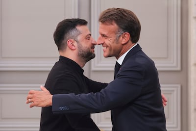 French President Emmanuel Macron and Ukraine's President Volodymyr Zelenskyy after a summit at the Elysee Palace in Paris on Thursday. AP