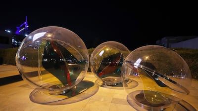 'Teela', a glass ball similar to a marble used by Emirati children to play a popular traditional game, is one of the art works installed next to the bus stops on Jumeirah beach road in Dubai. It is by Martin Kot. Pawan Singh / The National