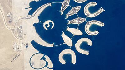 At the southern end of Bahrain Island, a new complex of 14 artificial islands has risen out of the sea. Designed for residential living and tourism, Durrat Al Bahrain includes 21 square km of new surface area for more than 1,000 residences, luxury hotels and shopping malls. Photo: Nasa / AFP