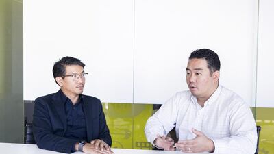The app is developed by Jae-Yong Hwang, right, and his agency MBLM, which William Shintani heads. Reem Mohammed / The National
