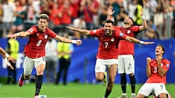 Soccer Football - FIFA World Cup 2026 - Round of 32 - Australia v Egypt - Dallas Stadium, Arlington, Texas, U. S. - July 3, 2026 Egypt's Trezeguet and Egypt's Emam Ashour celebrate after the match as Egypt qualify for the Round of 16 stage of the World Cup IMAGN IMAGES via Reuters / Maria Lysaker