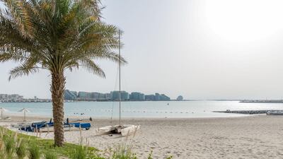 Al Zeina has its own private beach. Courtesy LuxuryProperty.com
