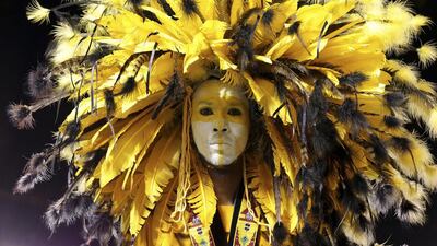 Fareed Raffick portrays a North American Indian warrior at the Traditional Mas Competition held during the annual Carnival celebrations, at Adam Smith Square, in the capital of Port-of-Spain, Trinidad and Tobago. Andrea de Silva / EPA