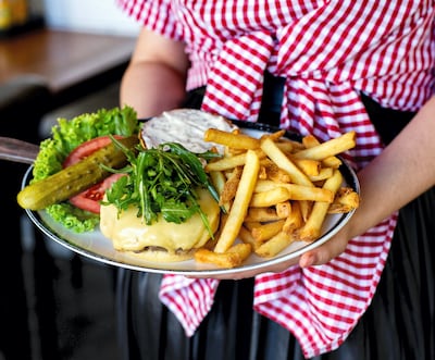 Black Tap offers a variety of burgers, from beef to chicken and a vegan option. Photo: Black Tap