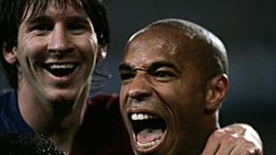 Lionel Messi, left, and Thierry Henry celebrate.