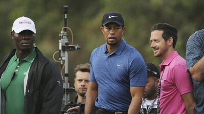 Tiger Woods walks to the 11th tee during the first round of the Omega Dubai Desert Classic. Kamran Jebreili / Associated Press