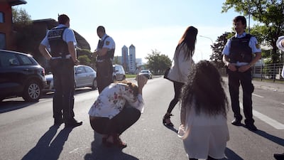 Police and witnesses wait in front of a discotheque in Constanc, at Lake Constance, Germany. Felix Kaestle / dpa via AP
