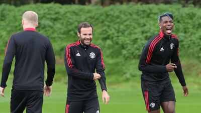 Juan Mata and Paul Pogba of Manchester United tune up for the trip to Leicester.