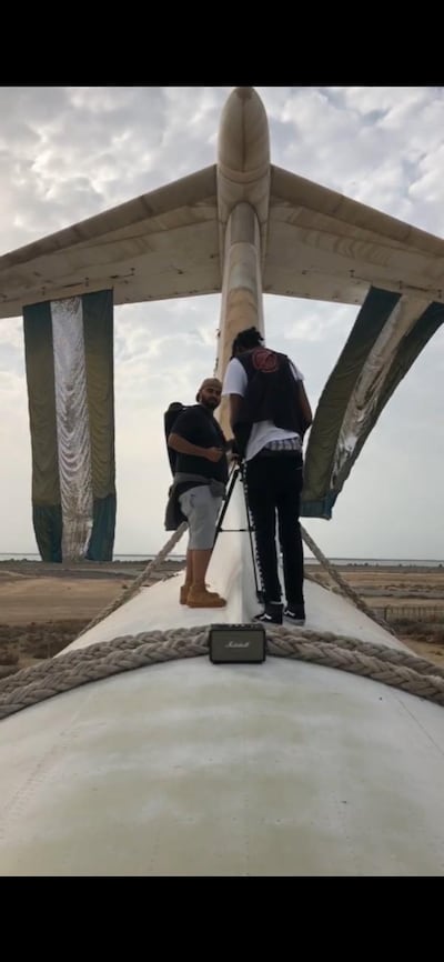 AIham Al Subaihi and Mustafa Ismail on top of the abandoned plane in Umm Al Quwain. Courtesy Aiham Al Subaihi