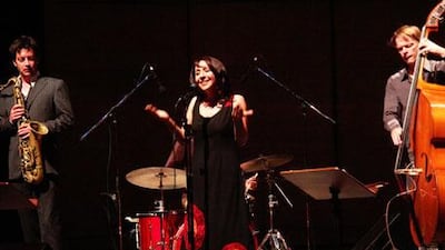 Rima Khcheich, singer, on stage with the Uri Honing Trio.