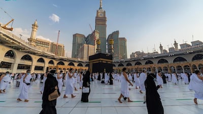 Pilgrims perform Umrah in compliance with Covid-19 social-distancing norms at the Grand Mosque in Makkah, Saudi Arabia. SPA