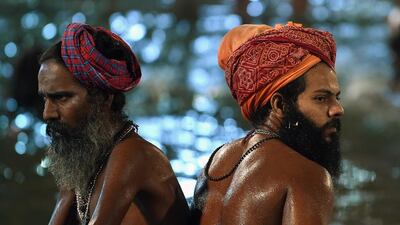 Tens of thousands of Hindu pilgrims and holy men washed on the first main bathing day of India’s Kumbh Mela festival on August 29. Punit Paranjpe / AFP PHOTO