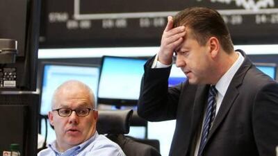 The Greek bailout package is in peril - and so is the future of the euro zone after the country's prime minister called for a referendum on the proposed bailout. Here, traders watch their screens in Frankfurt, Germany on Tuesday as the German stock index DAX drops by 6000 points.