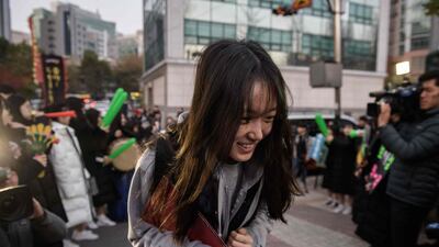 A student arrives at he Ehwa Girls Foreign Language High School in Seoul, South Korea. AFP