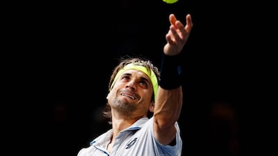 David Ferrer prepares to serve during a match at the Paris Masters last month. Dean Mouhtaropoulos / Getty Images / November 3, 2015