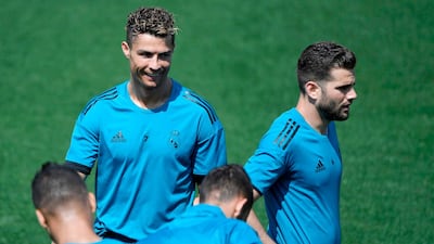 Real Madrid forward Cristiano Ronaldo and defender Nacho attend a training session. Gabriel Bouys / AFP