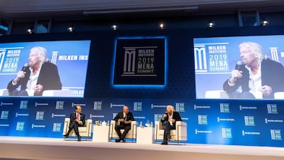 Michael Milken, Milken Institute, Kevin O’Leary, O’Shares ETFs and Sir Richard Branson at the Milken Summit in Abu Dhabi. Antonie Robertson/The National