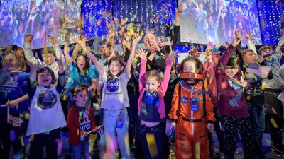 New Horizons principal investigator Alan Stern celebrating with school children at the exact moment that the New Horizons spacecraft made the closest approach of Kuiper Belt object Ultima Thule, in Laurel, Maryland. EPA