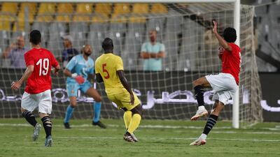 Egypt's Marwan Mohsen scores their first goal. Reuters