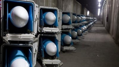 Missiles stored in an underground facility in an undisclosed location, Iran. Tehran claims its new equipment has 'advanced operational capabilities', including firing from underground launchers. AP