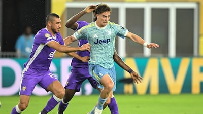 Al Ain defender Ramy Rabia and Juventus' Kenan Yildiz fight for the ball. AFP