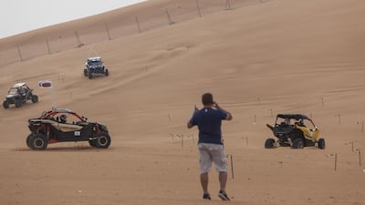 Competitors take part in a warm up and familiarisation lap before the first race. The elimination rounds and final race will be held on Friday. Antonie Robertson / The National