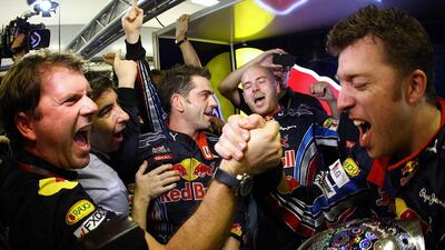 Sebastian Vettel and Red Bull Racing celebrate after winning the driver's championship during the Abu Dhabi Formula One Grand Prix at the Yas Marina Circuit in 2010. Getty