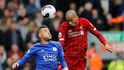 Liverpool's Fabinho with Leicester City's Jamie Vardy. Reuters