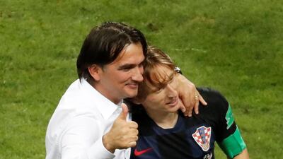 Croatia manager Zlatko Dalic, left, celebrates with Luka Modric. Reuters