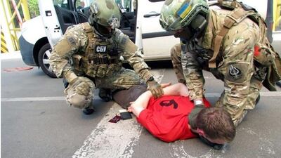 A still image showing the Security Service of Ukraine (SBU) detaining an unidentified Frenchman at an unspecified location. The SBU said on June 6, 2016 that the detained man was reportedly planning a series of terrorist attacks in France during the EURO 2016 in June 2016. EPA/Security Service of Ukraine handout