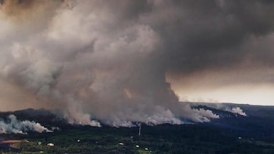A plume of volcanic steam rises from the alignment of fissures in Hawaii's Kilauea East Rift zone. Cindy Ellen Russell/Honolulu Star-Advertiser via AP