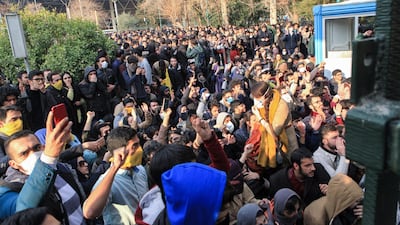 This photo shows people protesting inside the University of Tehran on December 30. AP