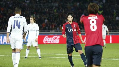 Kashima Antlers’ Gaku Shibasaki celebrates scoring their first goal with Shouma Doi. Kim Kyung-hoon / Reuters