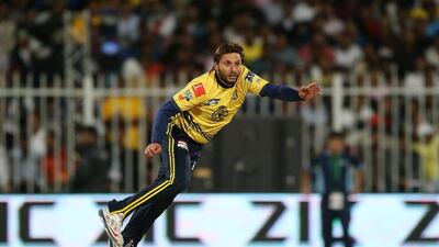 Shahid Afridi of Peshawar Zalmi bowling against Islamabad United in the Pakistan Super League T20 match at Sharjah Cricket Stadium in Sharjah. ( Pawan Singh / The National )