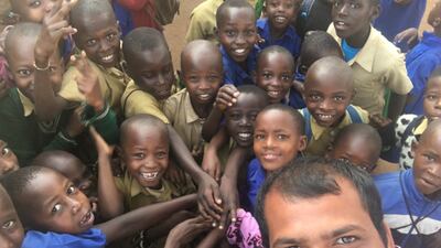 With school children in Rwanda