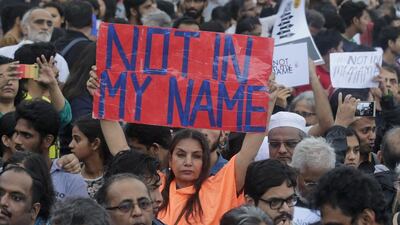 Bollywood actress Shabana Azmi holds up a placard during a protest in Mumbai against attacks by right-wing Hindu vigilantes, mostly on India’s Muslim minority, on June 28, 2017. Rafiq Maqbool / AP Photo