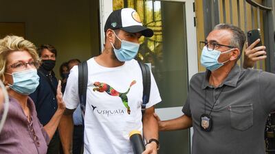 Barcelona forward Luis Suarez leaves Perugia's University in Perugia, Italy, on September 17, 2020 after taking an Italian language test ahead of a proposed move to Juventus. The Uruguayan is being investigated on suspicion of cheating to pass his Italian language test with the help of his teachers. EPA