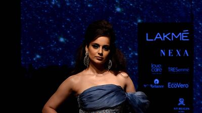 Kangana Ranaut presents a creation by designer Disha Patil at Lakme Fashion Week. Photo: Sujit Jaiswal / AFP
